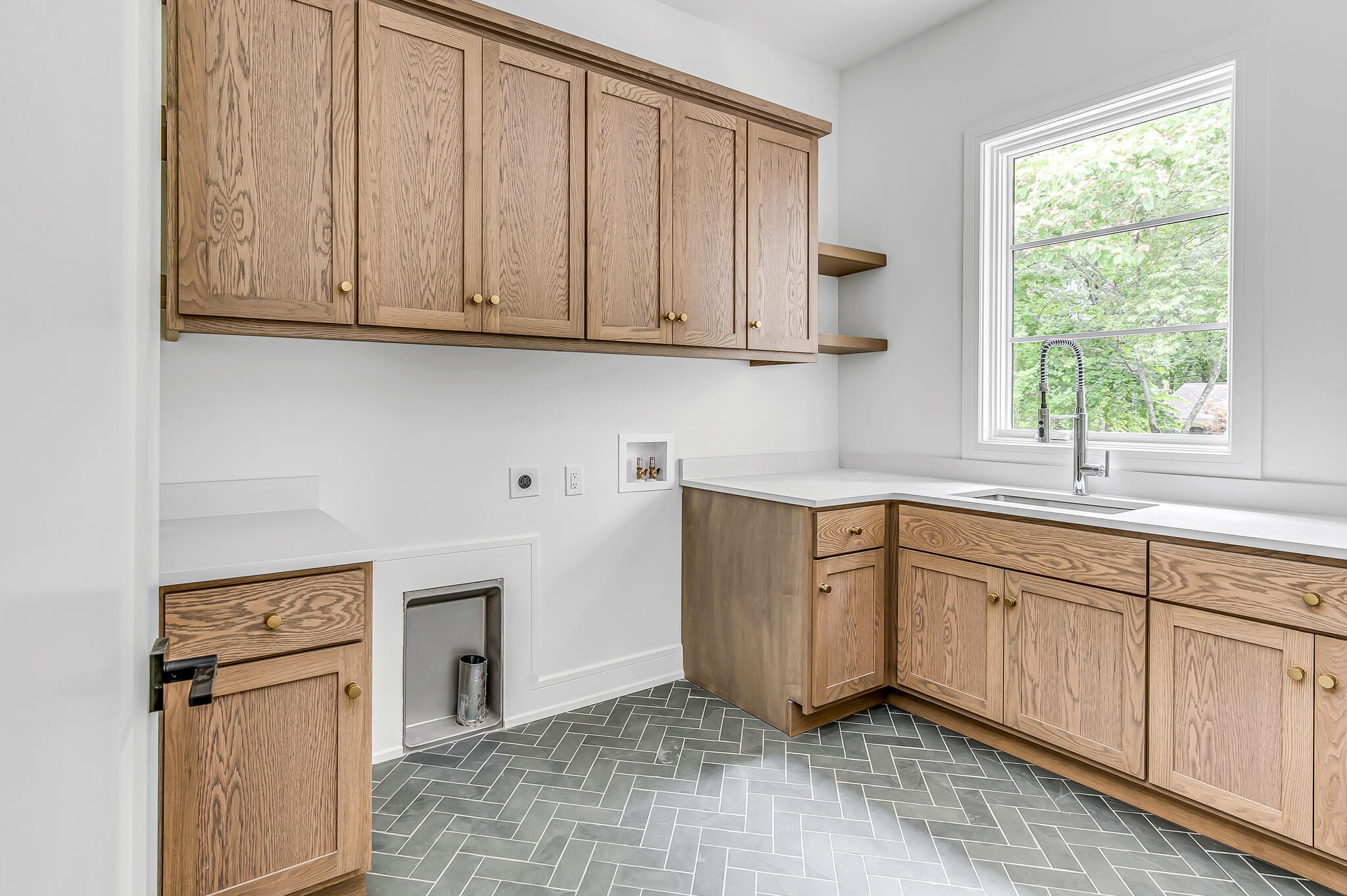 1401 Burton Valley Road Nashville, TN 37215 - Photo 40 of 68 a kitchen with granite countertop white cabinets stainless steel appliances a sink and a window