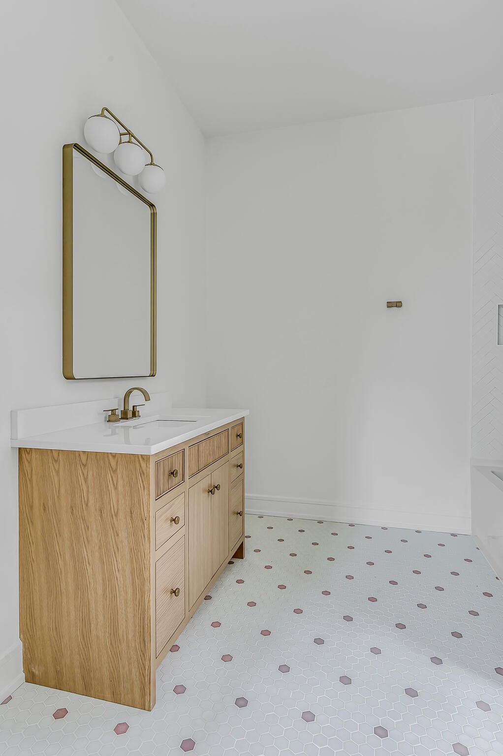 1401 Burton Valley Road Nashville, TN 37215 - Photo 49 of 68 a bathroom with a sink a mirror and shower