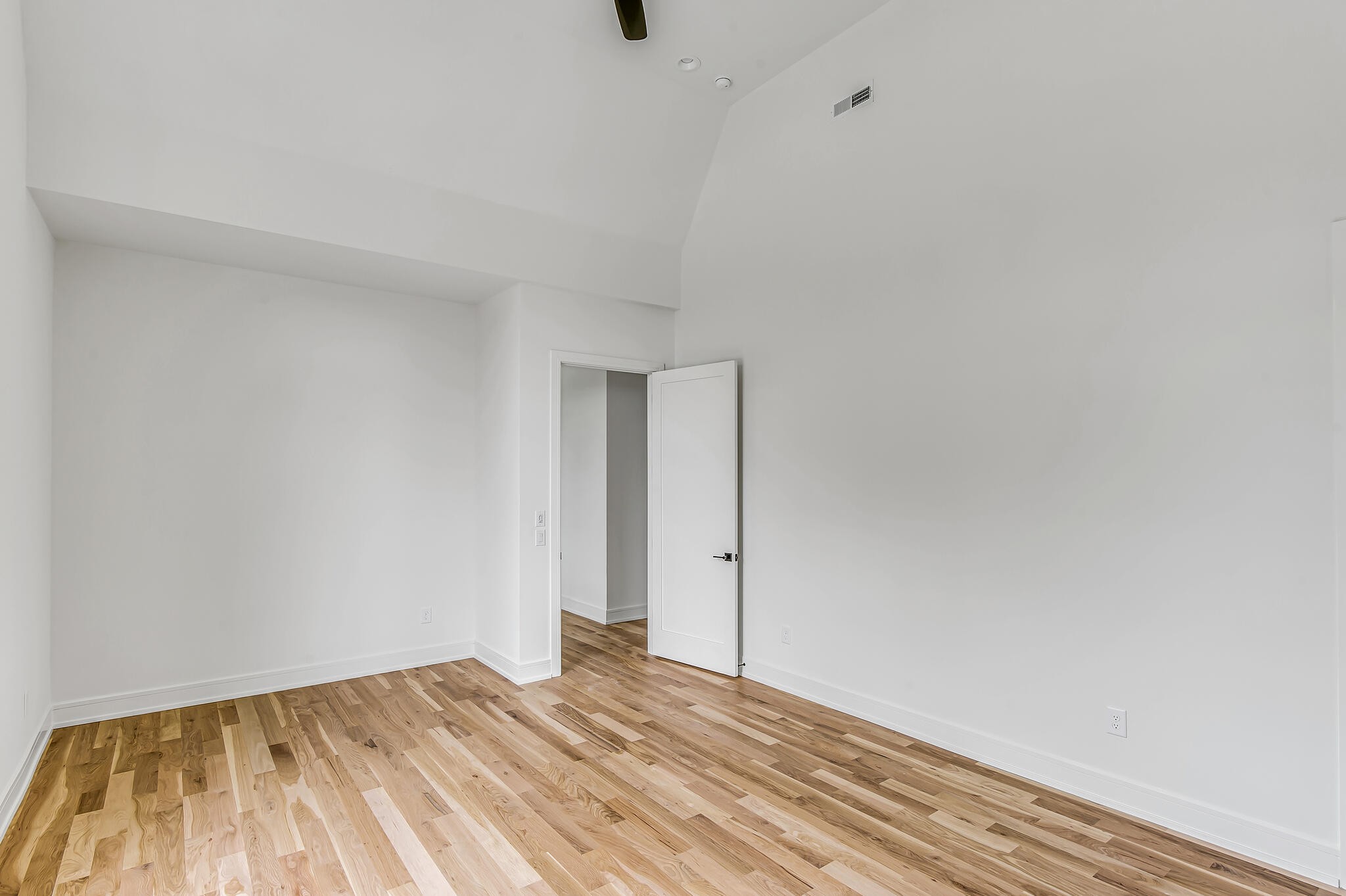 1401 Burton Valley Road Nashville, TN 37215 - Photo 56 of 68 a view of an empty room and wooden floor