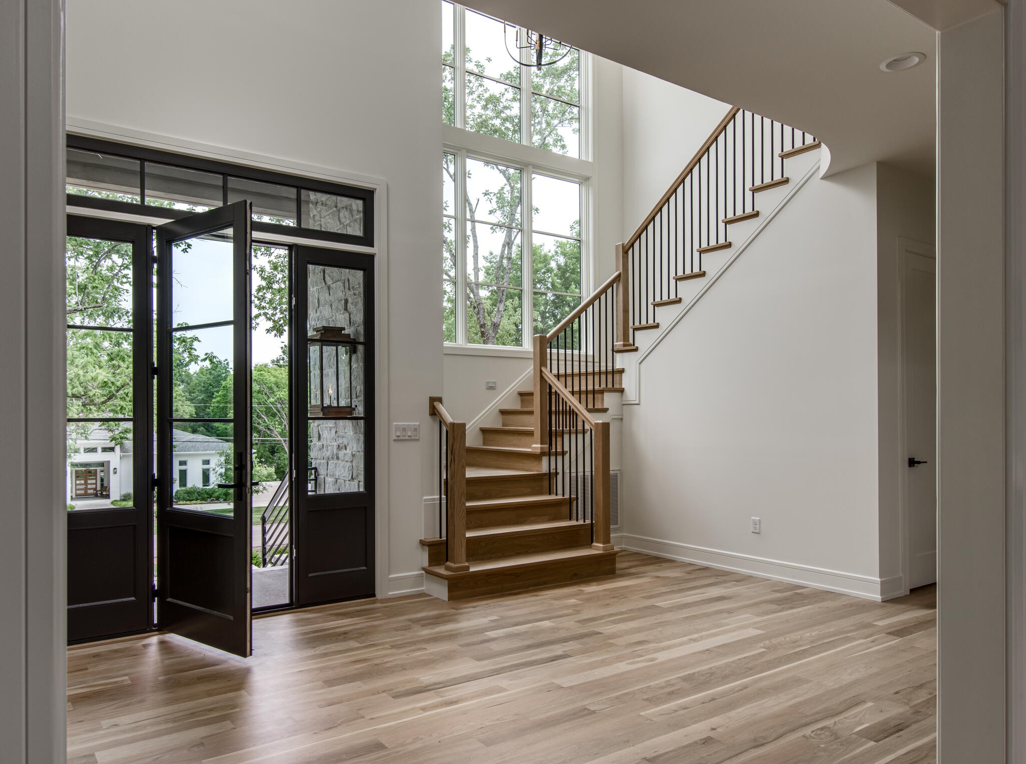 1401 Burton Valley Road Nashville, TN 37215 - Photo 6 of 68 a view of entryway and hall with wooden floor