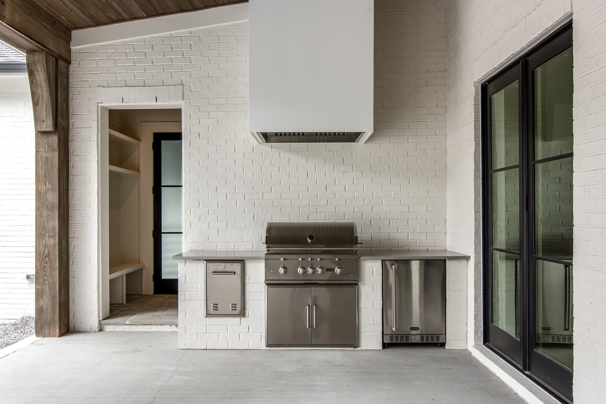 1401 Burton Valley Road Nashville, TN 37215 - Photo 64 of 68 a kitchen with stainless steel appliances granite countertop a stove and a refrigerator
