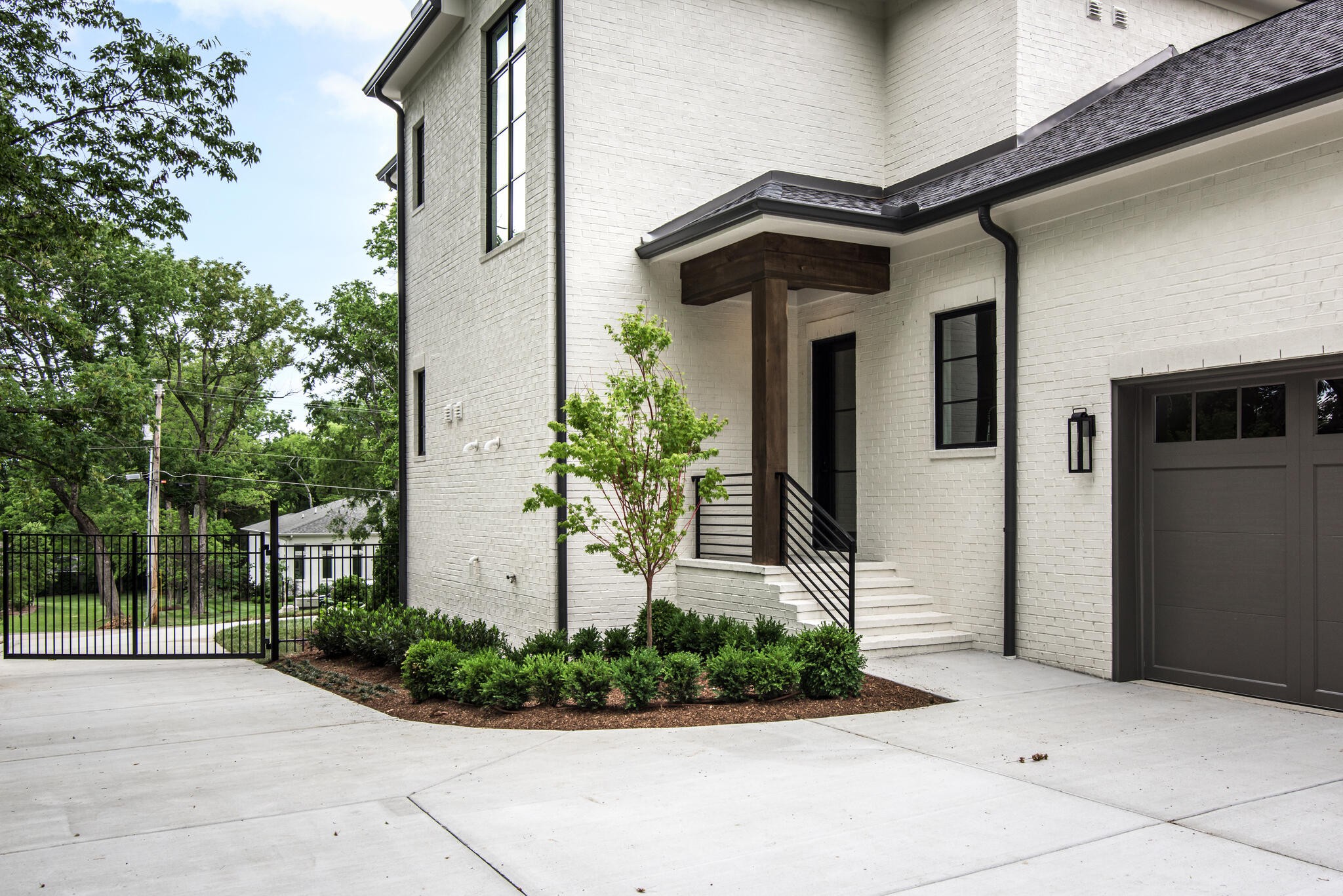 1401 Burton Valley Road Nashville, TN 37215 - Photo 68 of 68 a front view of a house with garden