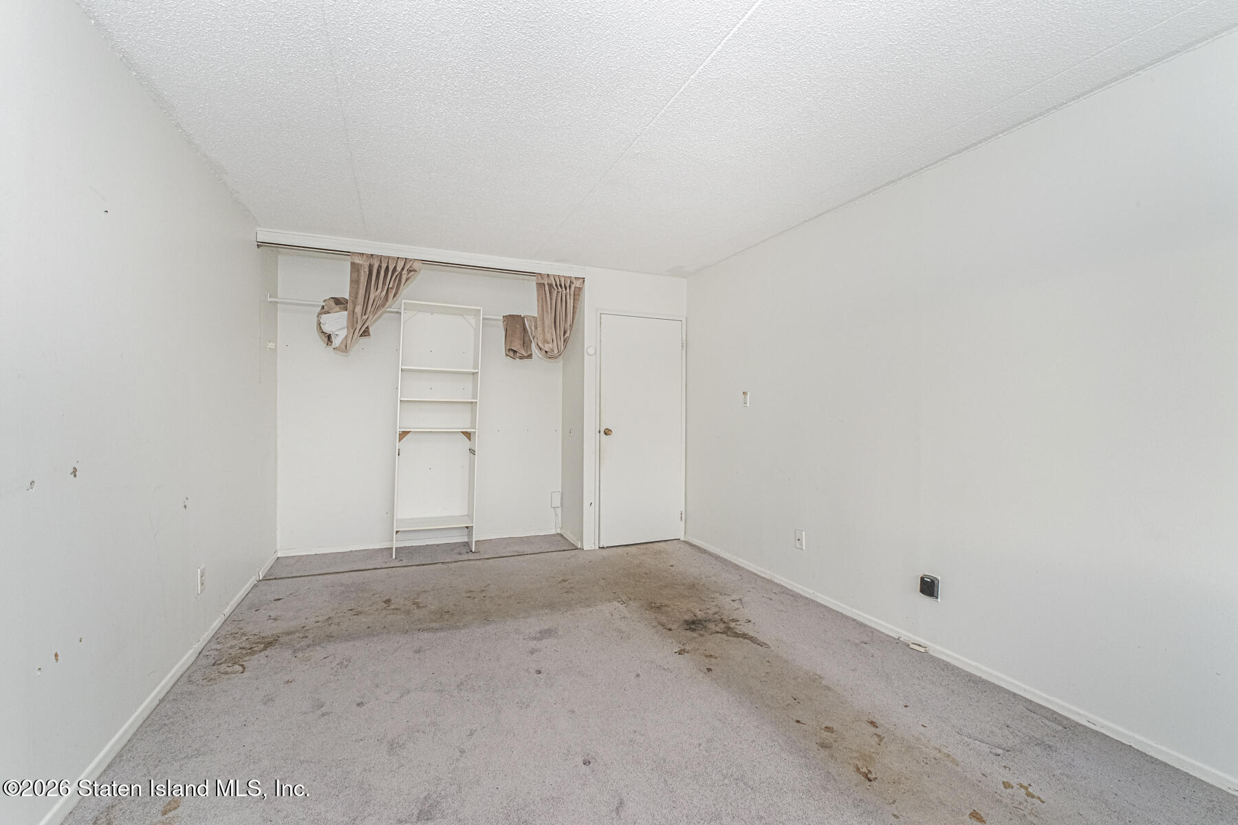 5 Windham Loop, Unit 7I Staten Island, NY 10314 - Photo 9 of 20 a view of an empty room