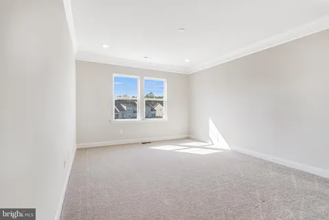 a front view of a building with glass windows