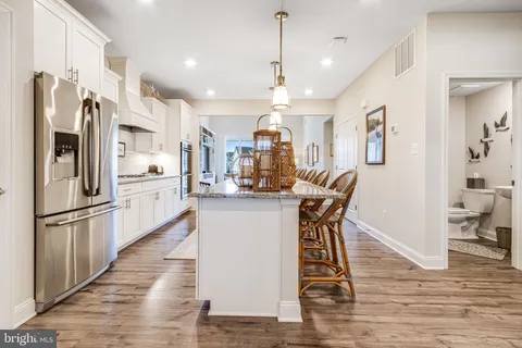 a close view of a sink and a mirror in a bathroom