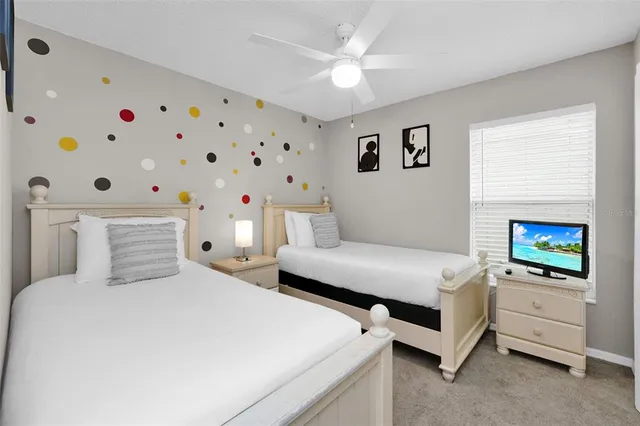 a bedroom with a bed and a fireplace