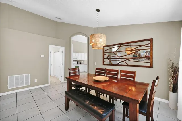 a view of a dining room with furniture