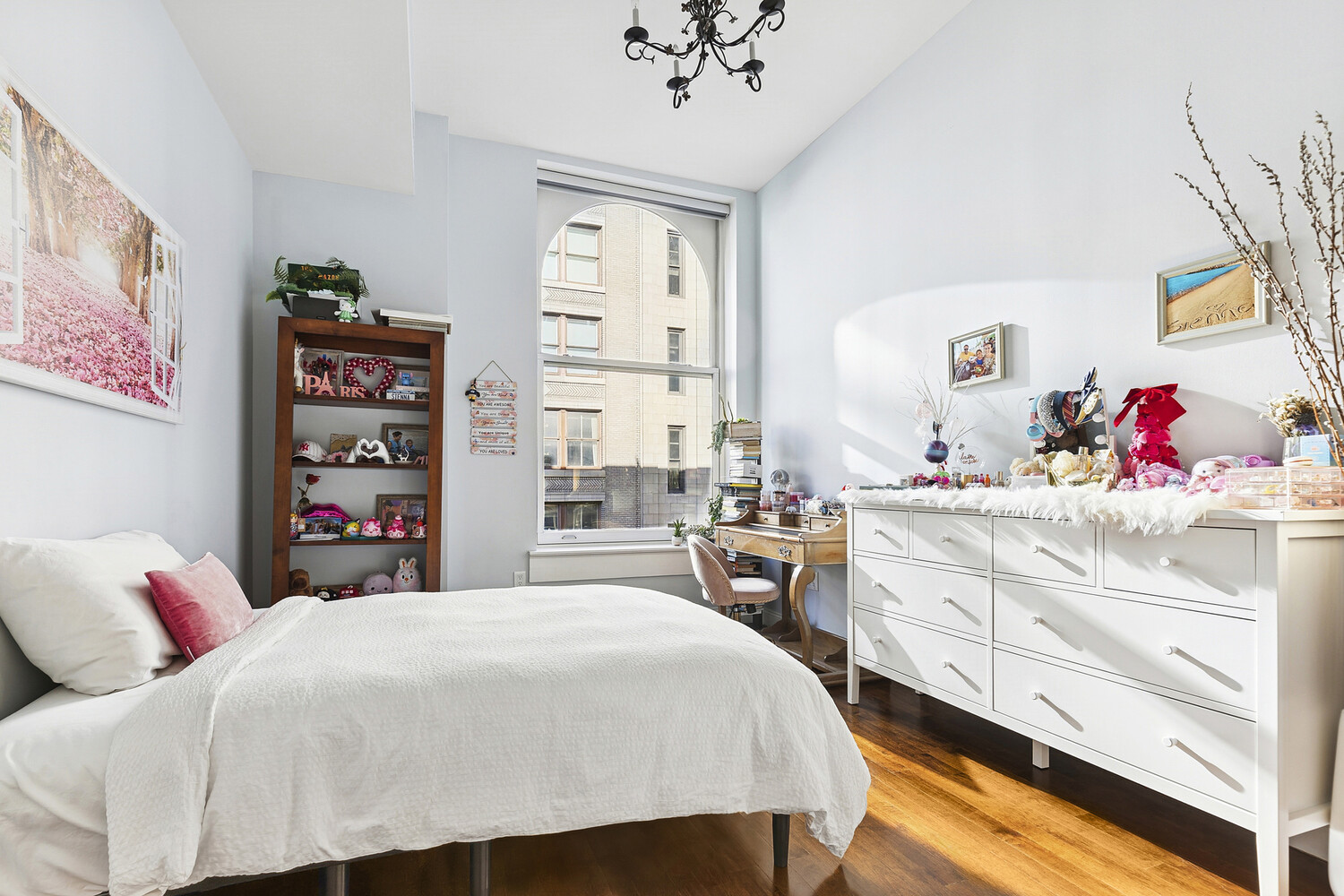 42 East 20th Street, Unit 7A Manhattan, NY 10003 - Photo 11 of 13 a bedroom with a bed and a cabinets