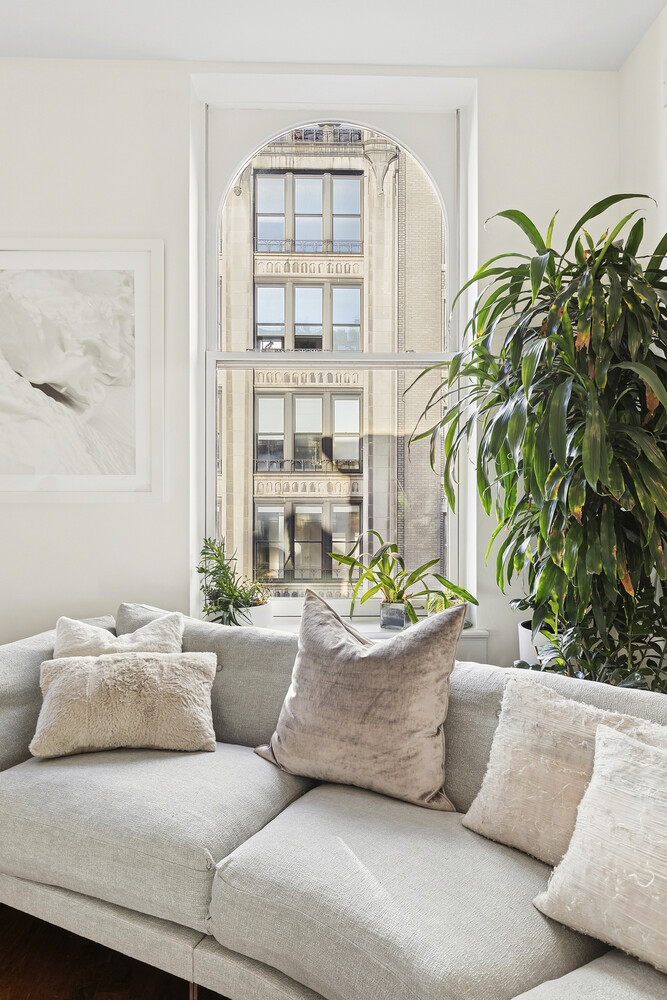 42 East 20th Street, Unit 7A Manhattan, NY 10003 - Photo 2 of 13 a living room with furniture and a potted plant