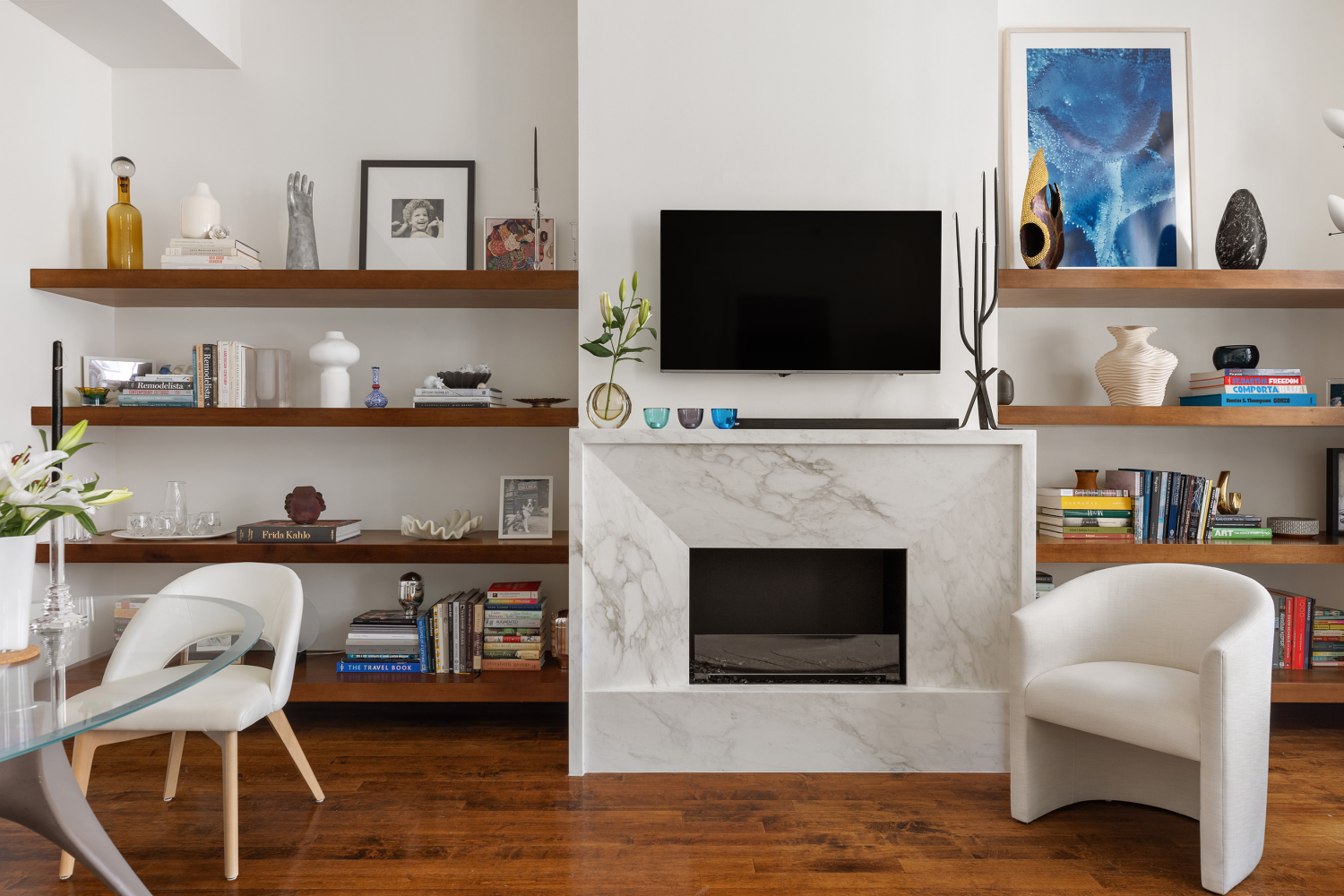 42 East 20th Street, Unit 7A Manhattan, NY 10003 - Photo 3 of 13 a living room with furniture and a flat screen tv