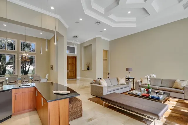 a living room with furniture and a table