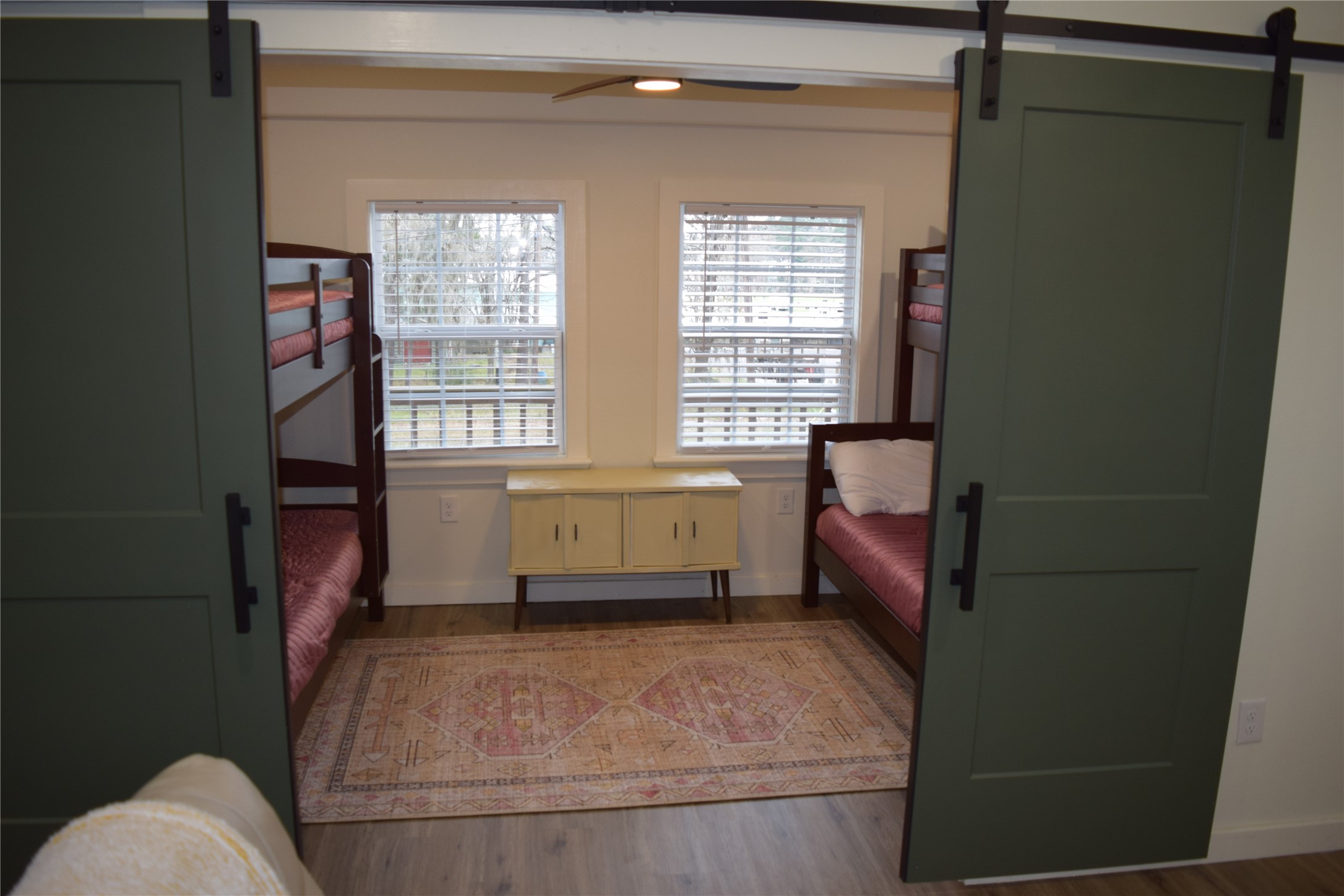237 Shawnee Drive Onalaska, TX 77360 - Photo 14 of 32 a bathroom with a tub sink and window