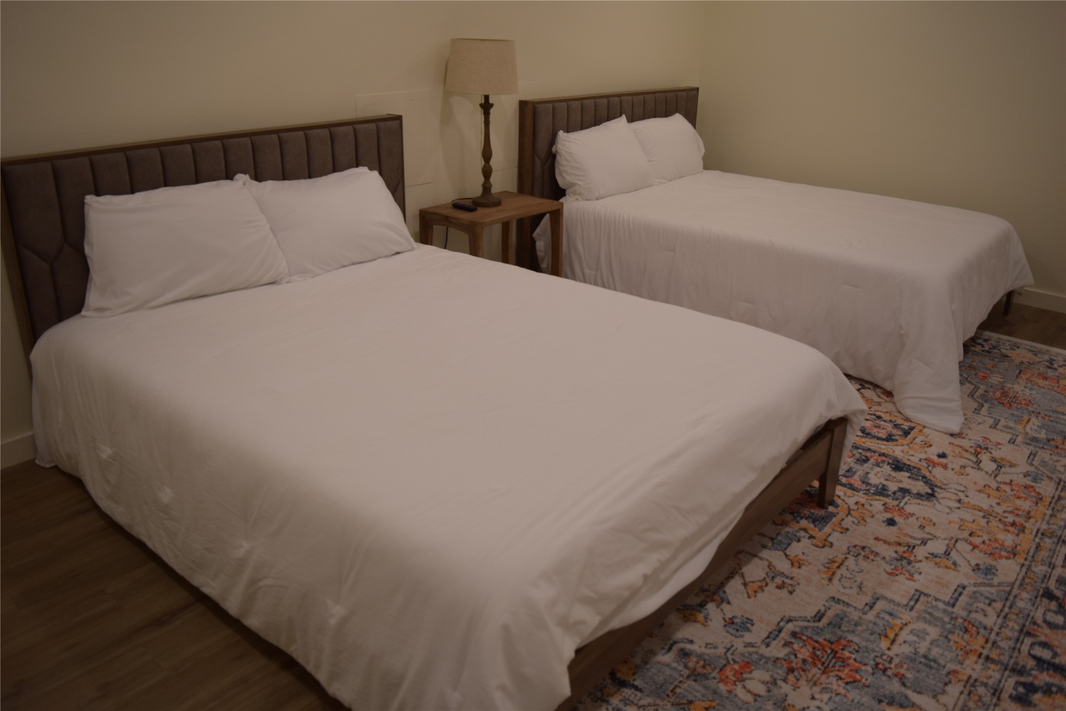 237 Shawnee Drive Onalaska, TX 77360 - Photo 17 of 32 a large bed sitting in a bedroom next to a lamp