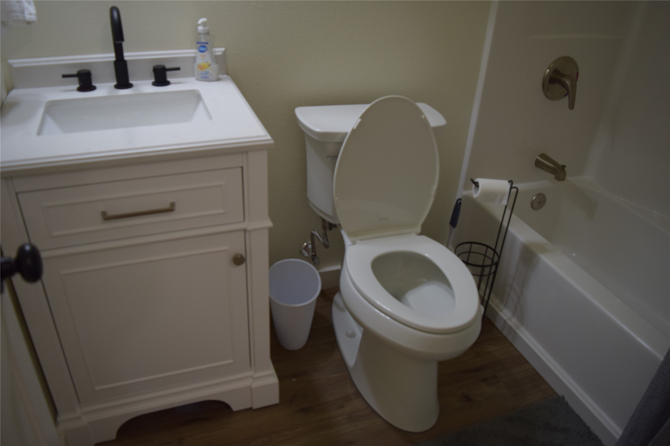 237 Shawnee Drive Onalaska, TX 77360 - Photo 23 of 32 a bathroom with a toilet and a sink