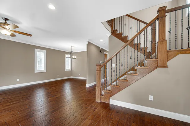 a view of an entryway with wooden floor