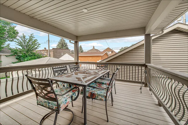 a view of a house with a yard and garage