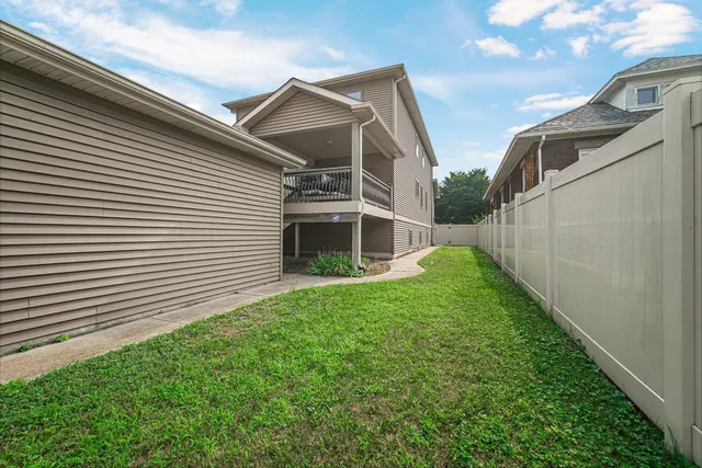 a small white house with a outdoor space