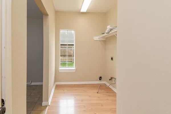 a view of a room that has a window in it