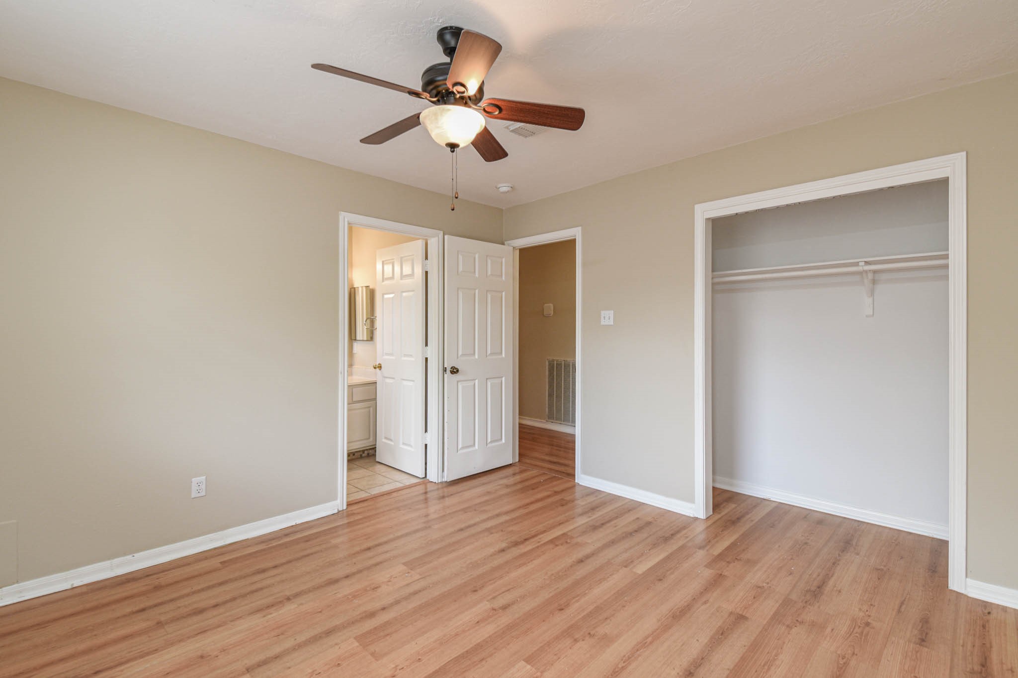 8806 Edenbridge Street Spring, TX 77379 - Photo 6 of 25 a view of an empty room with wooden floor