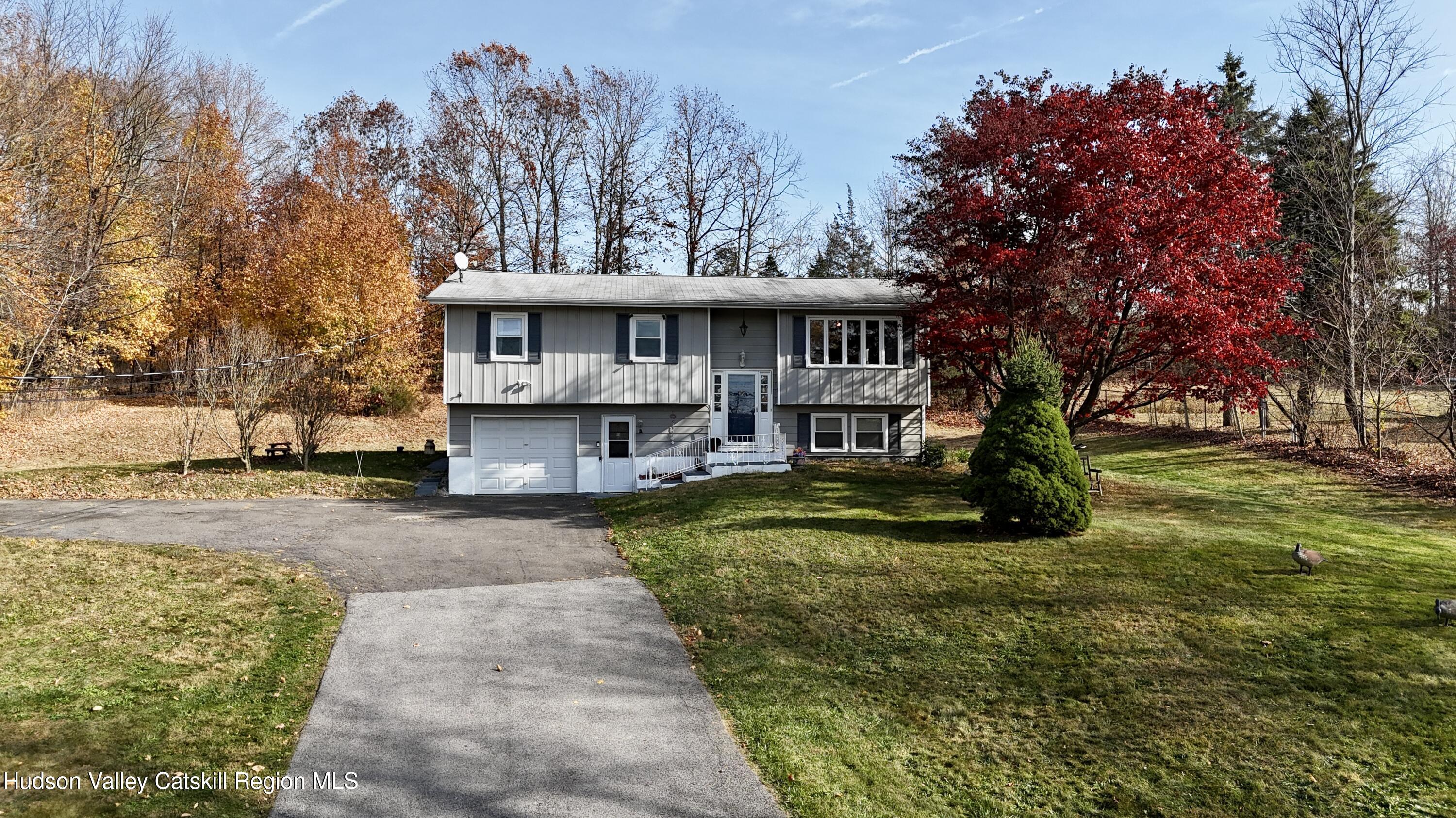322 Plattekill Ardonia Road Wallkill, NY 12589 - Photo 1 of 22 a view of a house with a yard