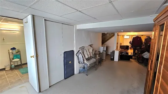 a view of a livingroom with gym equipment