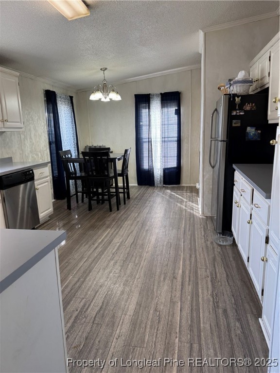 3082 Alamac Road Lumberton, NC 28358 - Photo 12 of 30 a view of a livingroom with furniture hardwood floor and a kitchen