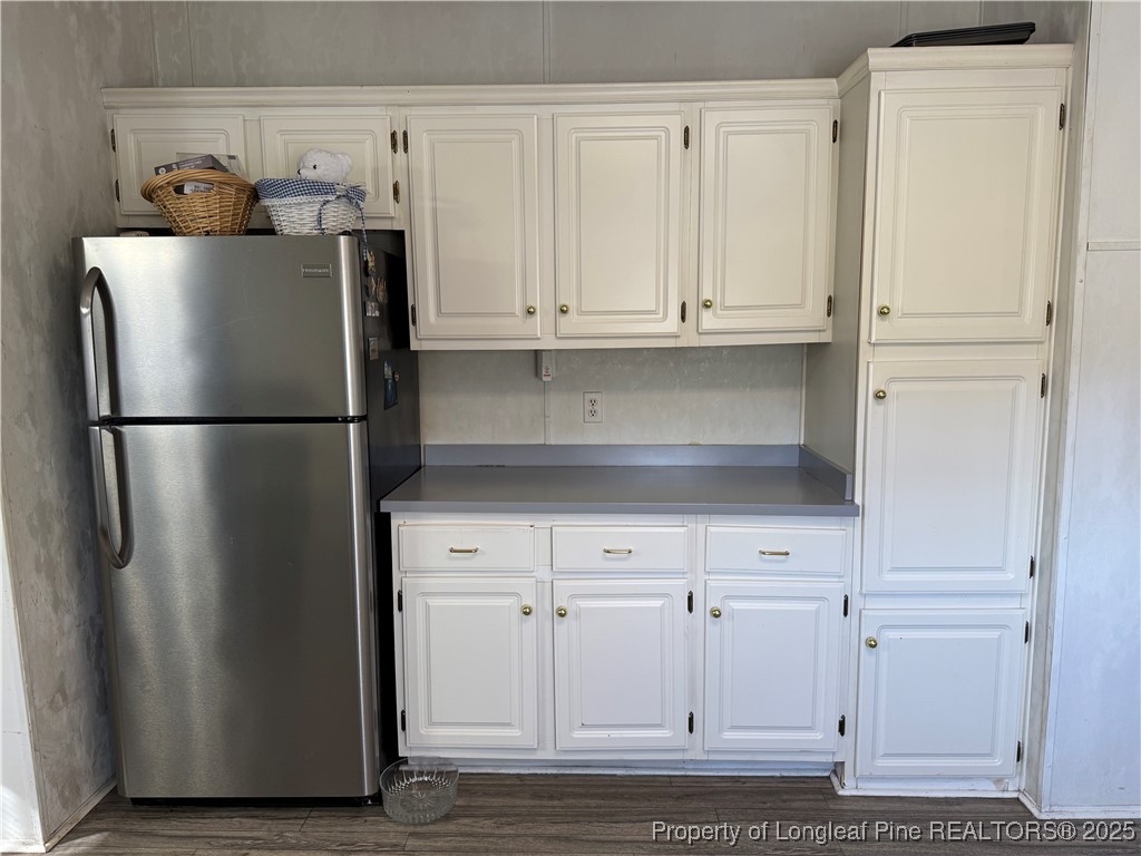 3082 Alamac Road Lumberton, NC 28358 - Photo 15 of 30 a white refrigerator freezer sitting inside of a kitchen
