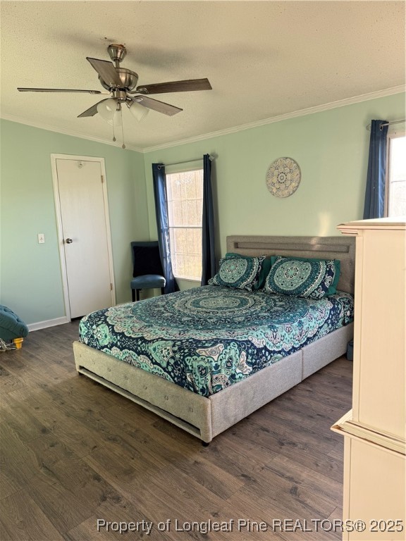 3082 Alamac Road Lumberton, NC 28358 - Photo 18 of 30 a bed sitting in a bedroom next to a window