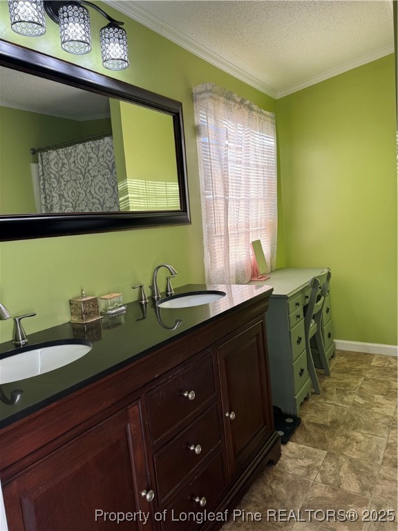 3082 Alamac Road Lumberton, NC 28358 - Photo 20 of 30 a bathroom with a double vanity sink and a mirror