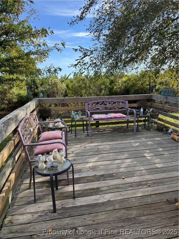 3082 Alamac Road Lumberton, NC 28358 - Photo 24 of 30 a view of a terrace with furniture
