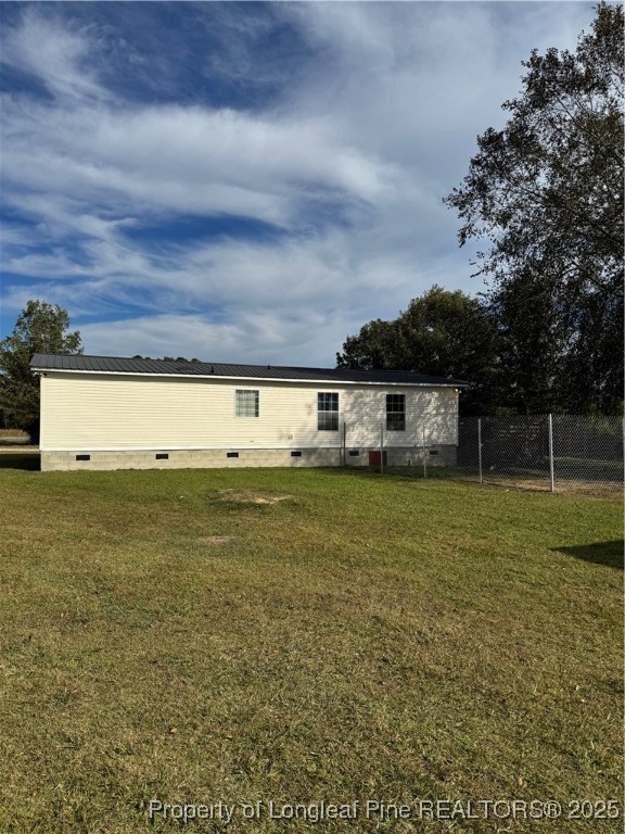 3082 Alamac Road Lumberton, NC 28358 - Photo 27 of 30 a view of a big room with an empty space