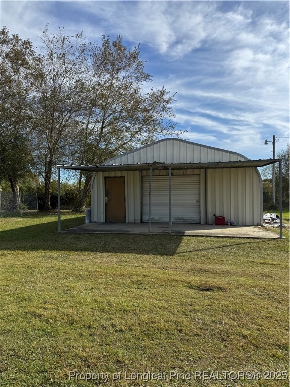 3082 Alamac Road Lumberton, NC 28358 - Photo 29 of 30 a view of a house with a swimming pool