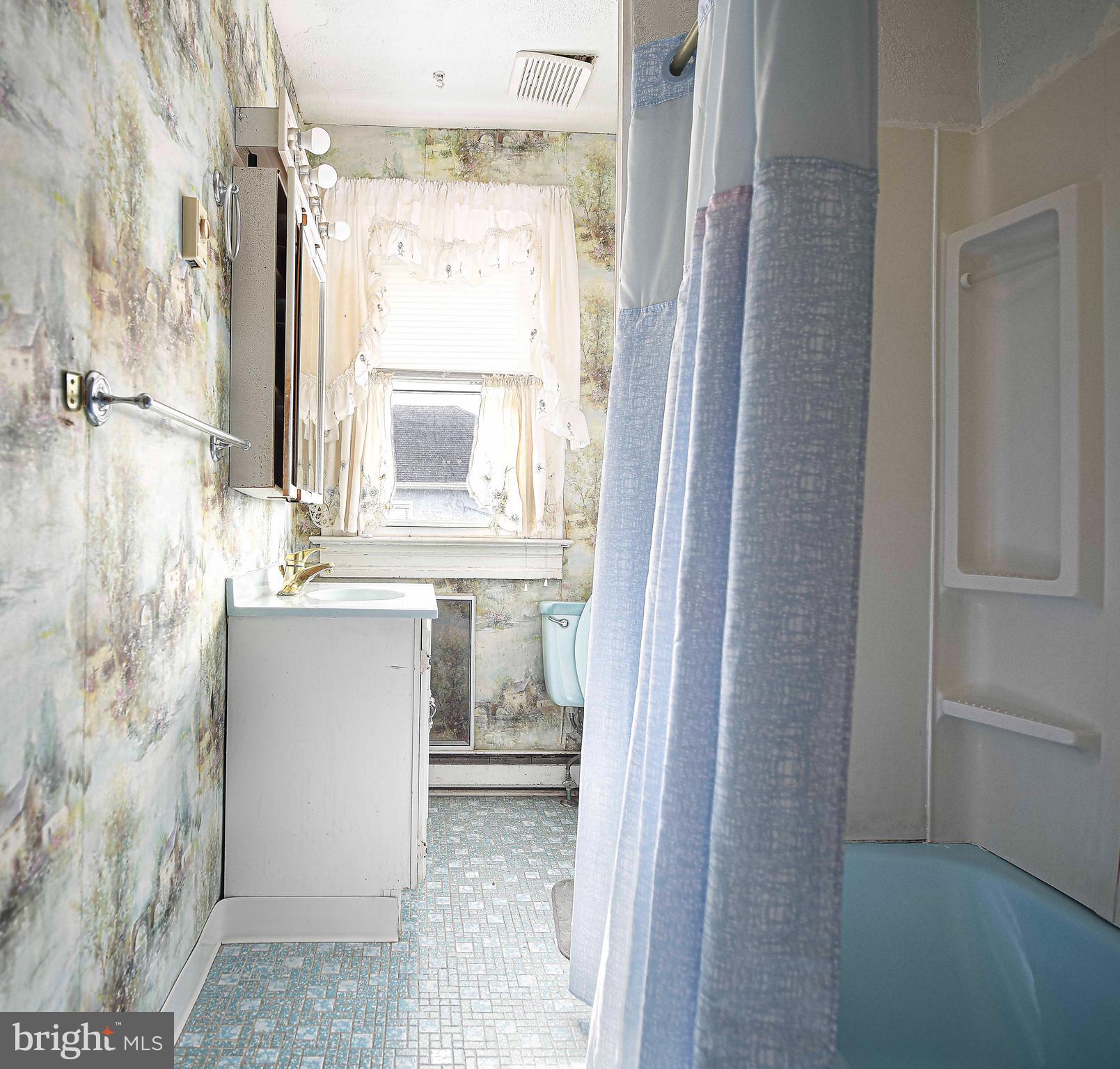 1531 Perryman Road Aberdeen, MD 21001 - Photo 15 of 23 a bathroom with a sink toilet and shower