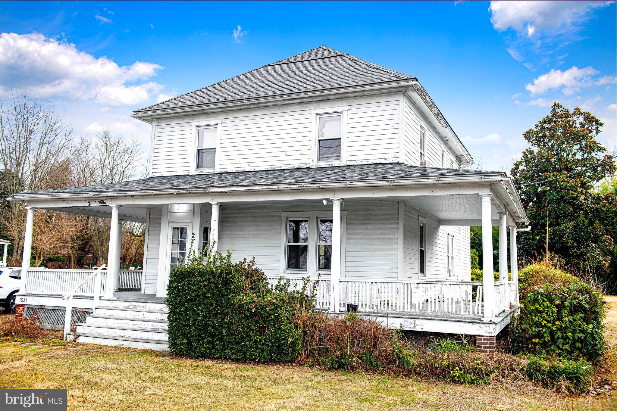 1531 Perryman Road Aberdeen, MD 21001 - Photo 2 of 23 a front view of a house with a yard