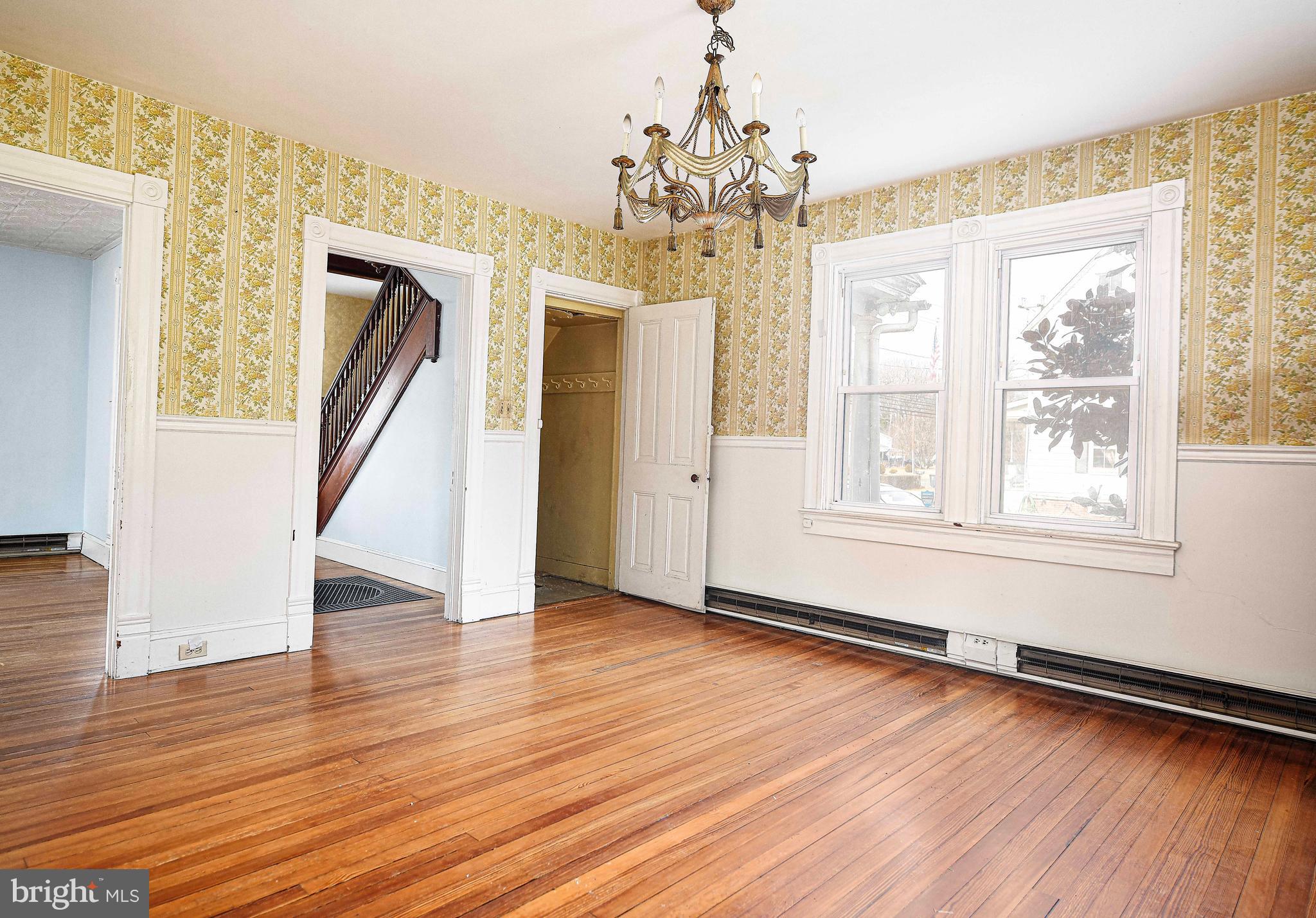 1531 Perryman Road Aberdeen, MD 21001 - Photo 8 of 23 a view of an empty room with wooden floor and a window