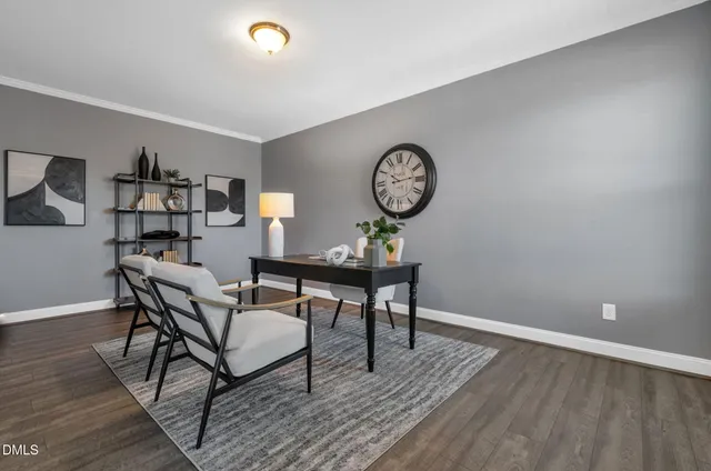 a bedroom with a bed and lamp with window