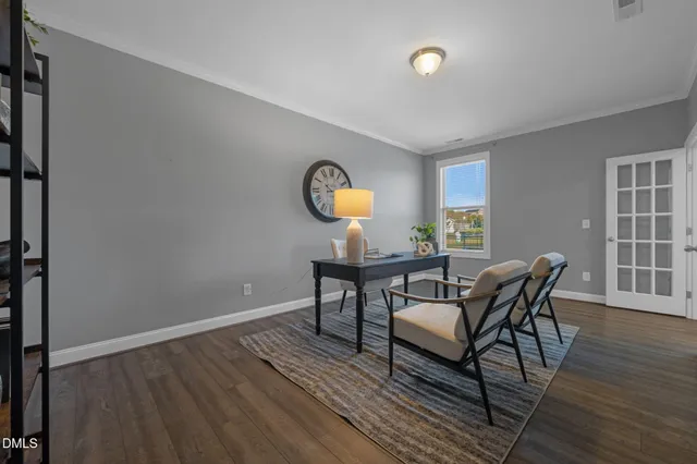 a bedroom with a bed and cabinets