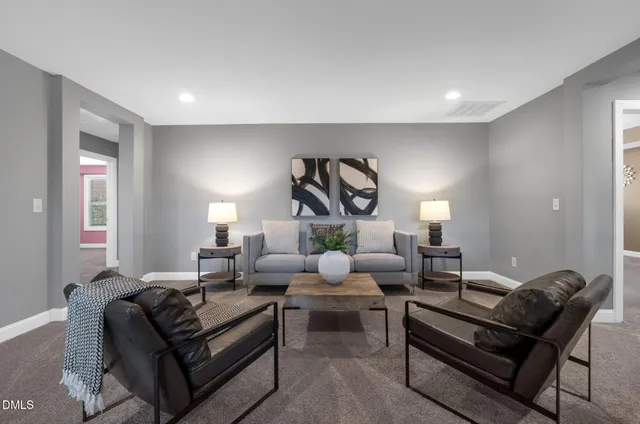 a spacious bathroom with a double vanity sink and a mirror