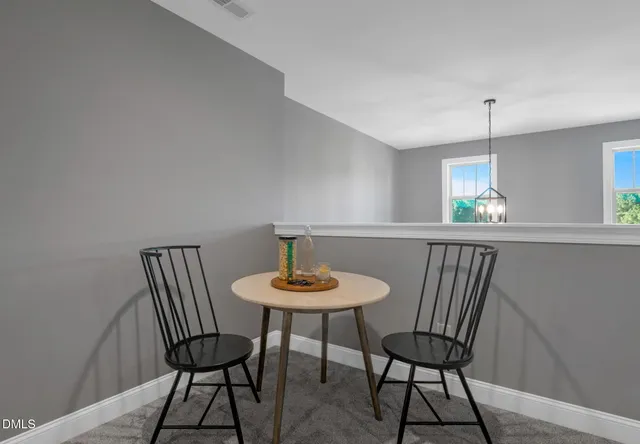 a room with a bed and a window