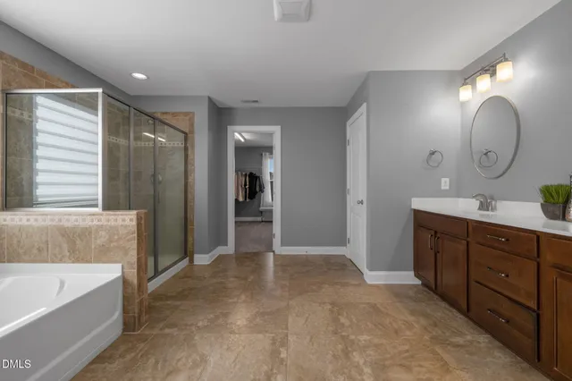 a view of sitting area with furniture and wooden floor