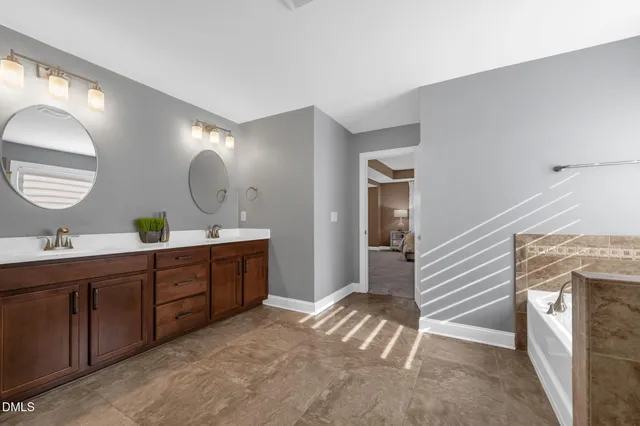 a swimming pool with outdoor seating