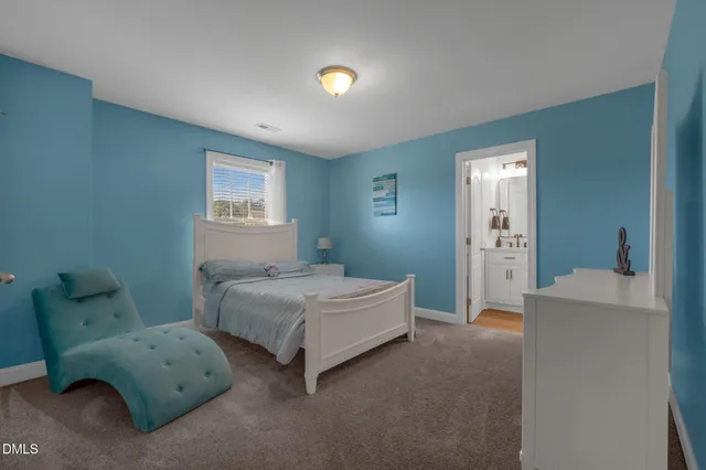 a view of a swimming pool with a yard