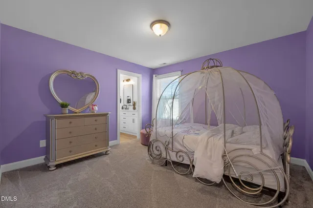 a view of a patio with a table and chairs