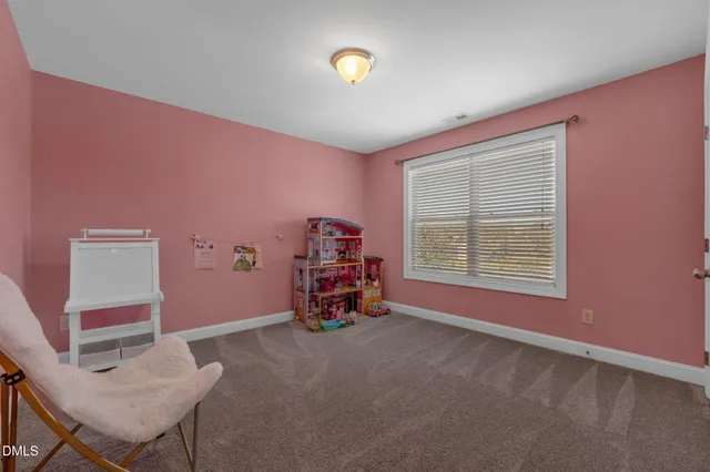 a view of house with outdoor seating space