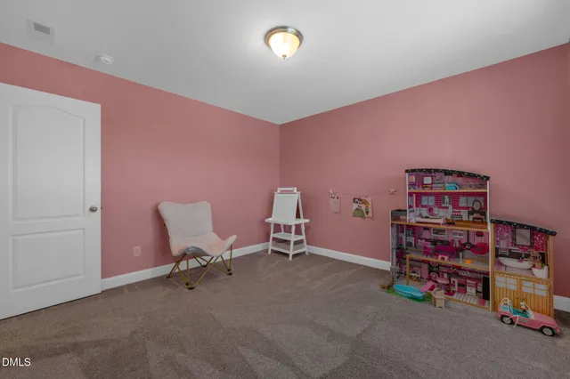 a view of a chairs and table in a porch