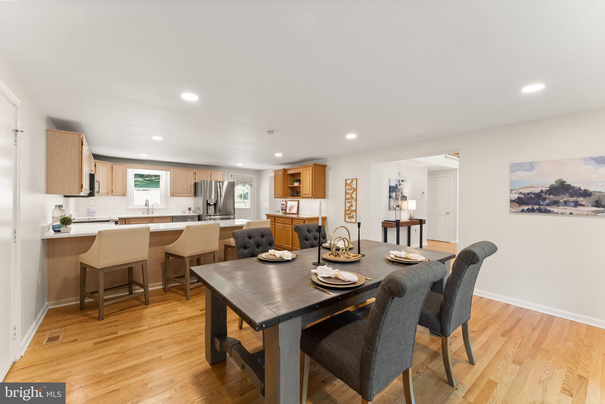 38620 Lime Kiln Road Leesburg, VA 20175 - Photo 40 of 87 a view of a dining room with furniture