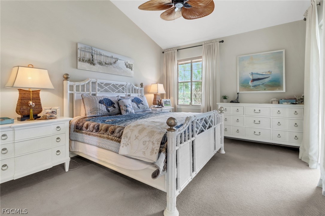 13020 Pebblebrook Point Circle, Unit 202 Fort Myers, FL 33905 - Photo 16 of 40 a bedroom with a bed and a window