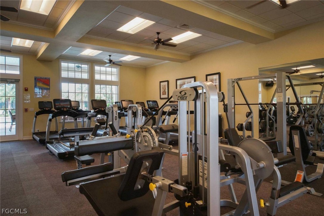 13020 Pebblebrook Point Circle, Unit 202 Fort Myers, FL 33905 - Photo 28 of 40 a view of a room with gym equipment