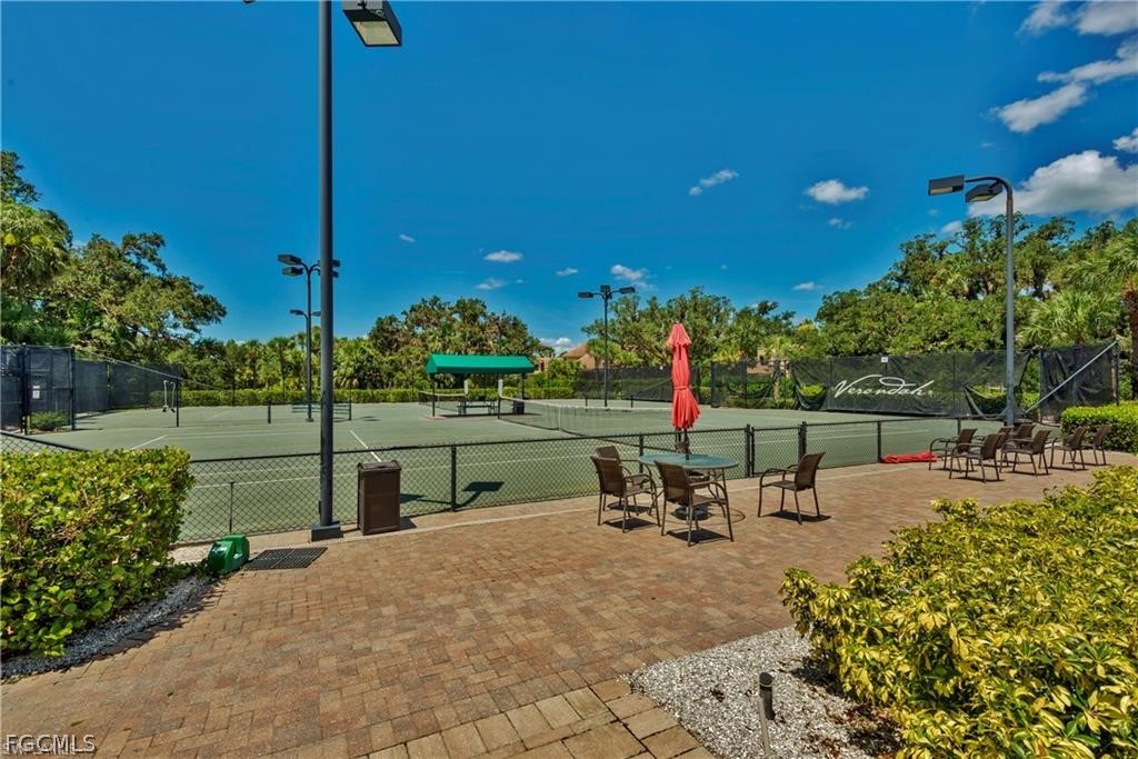 13020 Pebblebrook Point Circle, Unit 202 Fort Myers, FL 33905 - Photo 33 of 40 a view of a garden with sitting area