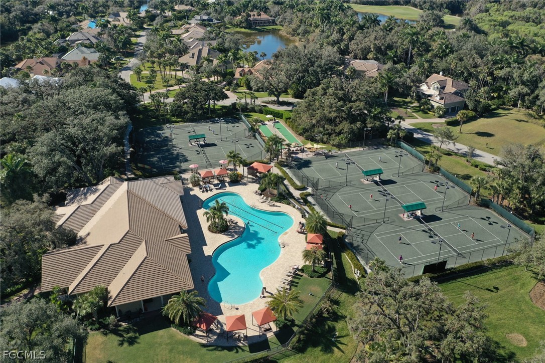 13020 Pebblebrook Point Circle, Unit 202 Fort Myers, FL 33905 - Photo 36 of 40 an aerial view of a house with a yard